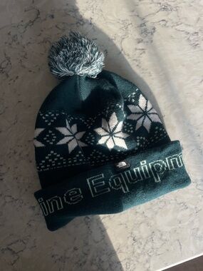 The North Face Dark Teal Pom Beanie with Snowflake Knit